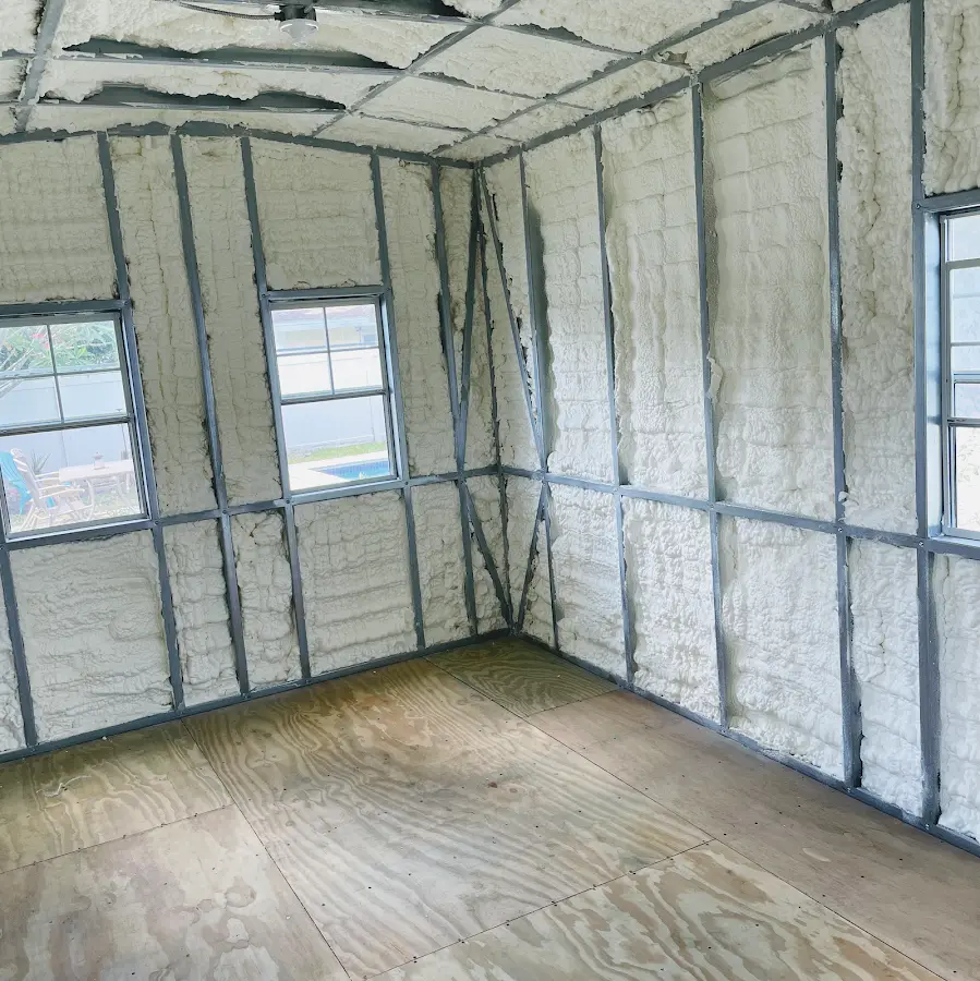 Closed-cell spray foam insulation applied to wall cavities in a residential project in The Acreage